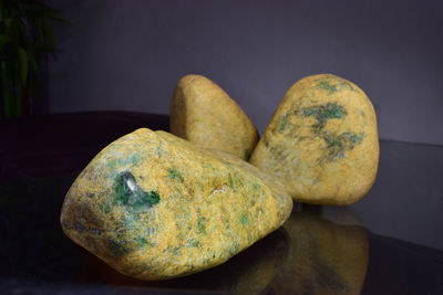 Close-up of bananas on rock