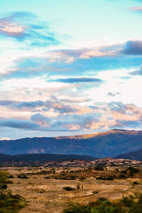 Scenic view of landscape against sky during sunset