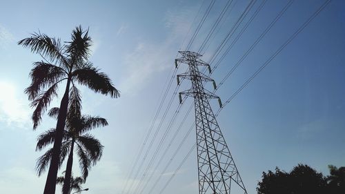 Low angle view of silhouette tree against sky