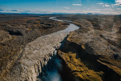 Aerial view of cityscape against sky