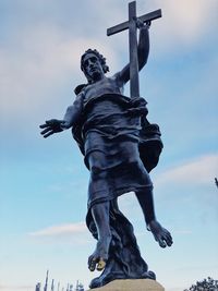 Low angle view of statue against sky