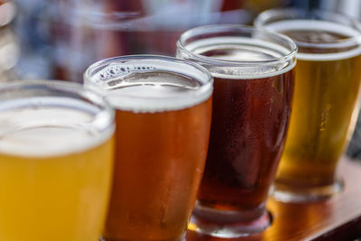 Close-up of beer in glasses