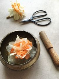 High angle view of flowers in bowl on table