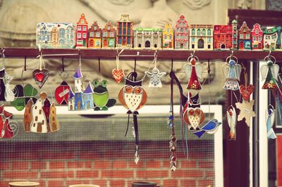 Close-up of decorations hanging at market stall