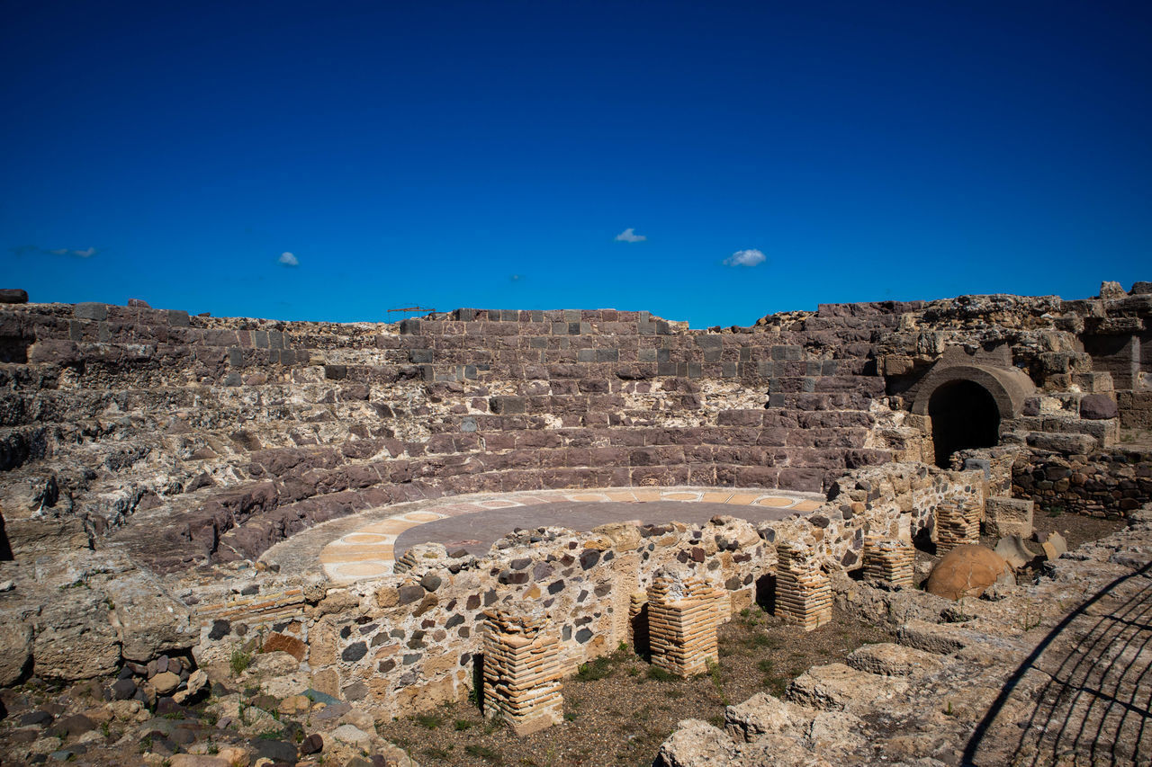 VIEW OF OLD RUINS AGAINST BLUE SKY