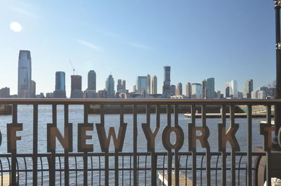 View of city buildings against clear sky