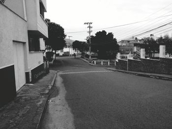 Road in city against sky