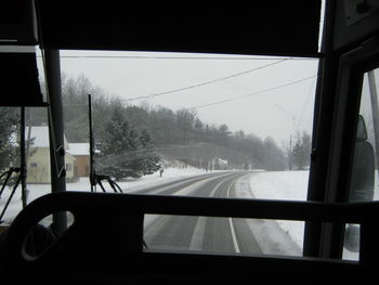 Road seen through car windshield