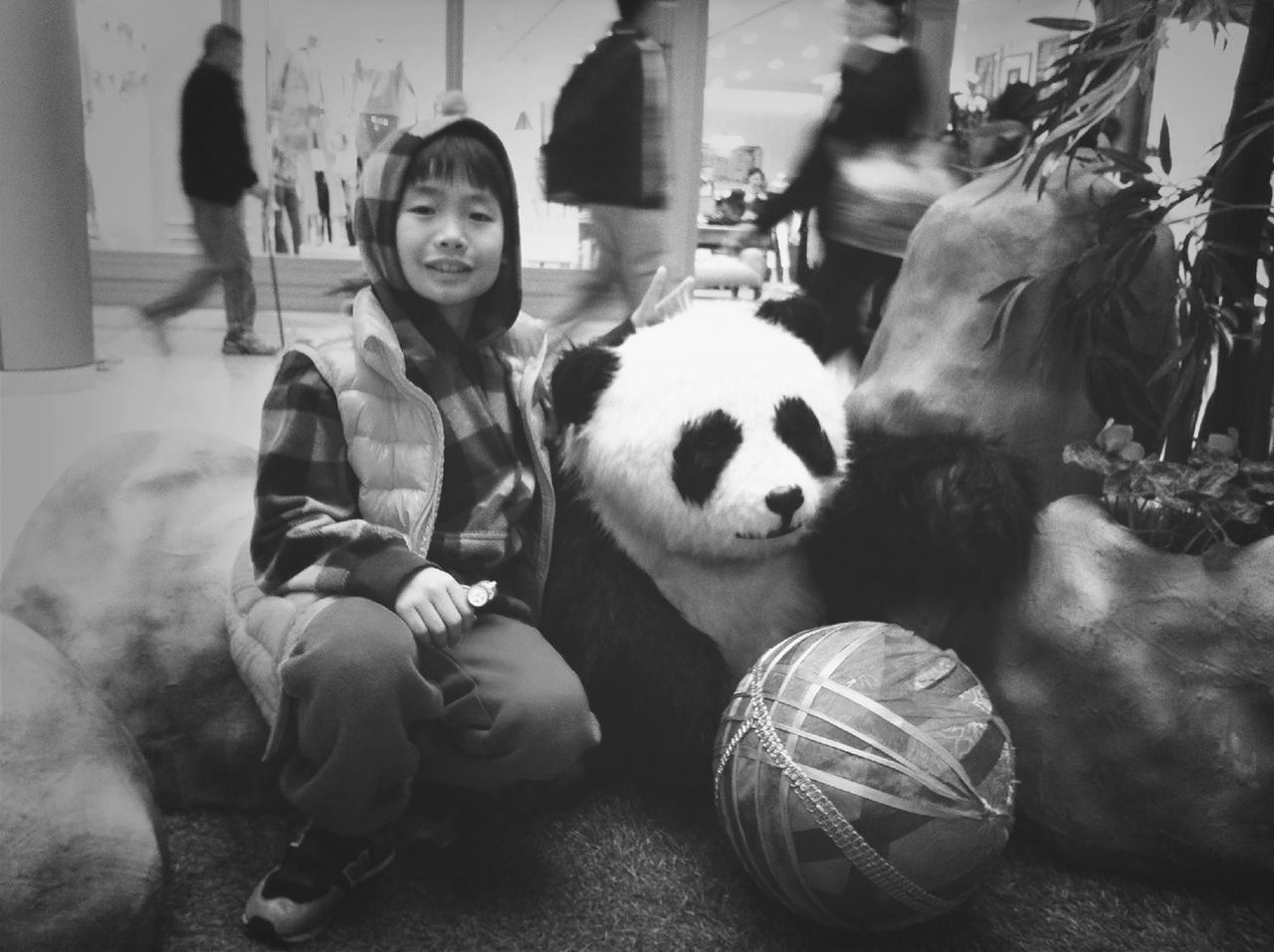 lifestyles, portrait, leisure activity, togetherness, childhood, indoors, looking at camera, casual clothing, front view, toy, happiness, person, standing, boys, smiling, sitting, incidental people, bonding, holding