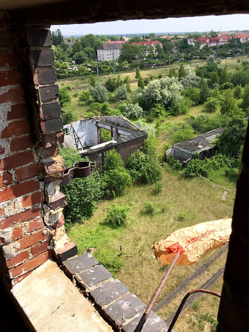 built structure, architecture, building exterior, grass, house, high angle view, green color, tree, plant, old, abandoned, day, growth, auto post production filter, transfer print, damaged, outdoors, no people, field, obsolete