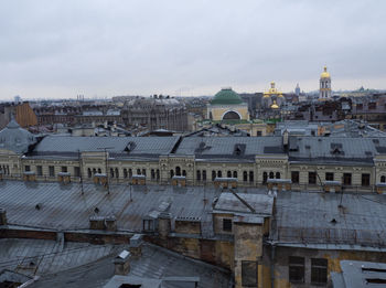 View of buildings in city against sky