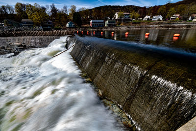 Blurred motion of dam by river