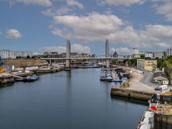 Boats moored at harbor