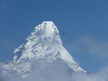 Scenic view of snowcapped mountain against sky