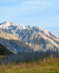 Scenic view of snowcapped mountains against sky