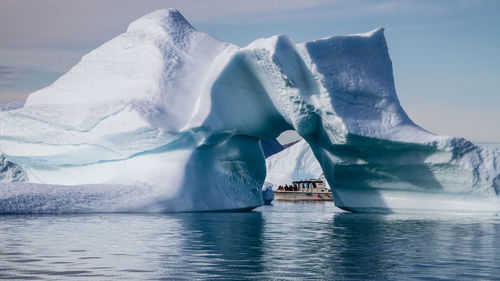 Scenic view of frozen sea against sky