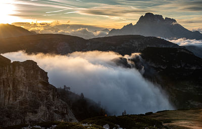 Scenic view of mountains against sky during sunset