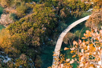 Autumn landscape with path across lake at plitvice lakes national park in croatia