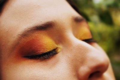 Close-up of woman with eyes closed