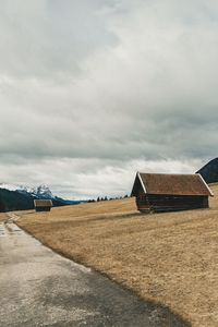 House on field against sky