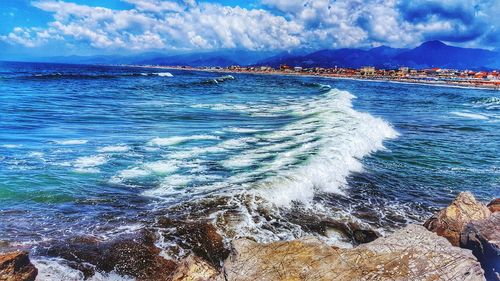 Scenic view of beach against sky