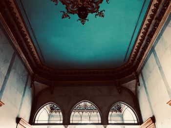 Low angle view of ornate ceiling in historic building