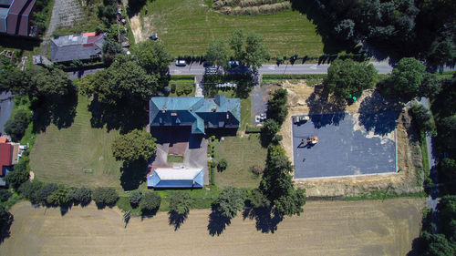 High angle view of houses amidst trees