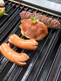 Close-up of meat on barbecue grill
