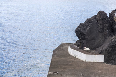 High angle view of rock formations on beach