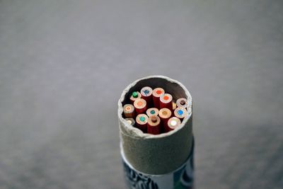 High angle view of multi colored buttons on table