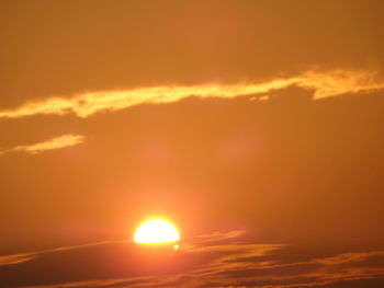 Scenic view of dramatic sky during sunset