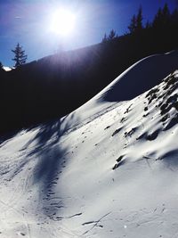 Scenic view of landscape against sky during winter