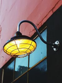 Low angle view of yellow hanging light