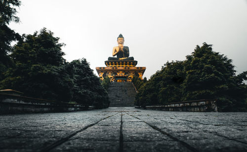 Statue of temple against clear sky