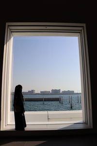 Buildings seen through window