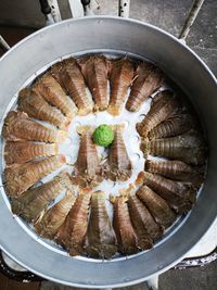 High angle view of seafood in cooking pot. 