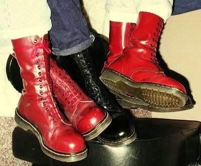 low section, shoe, person, footwear, red, standing, indoors, fashion, jeans, canvas shoe, human foot, pair, lifestyles, high angle view, sock, boot, shoelace