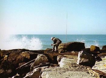 Scenic view of sea against clear sky