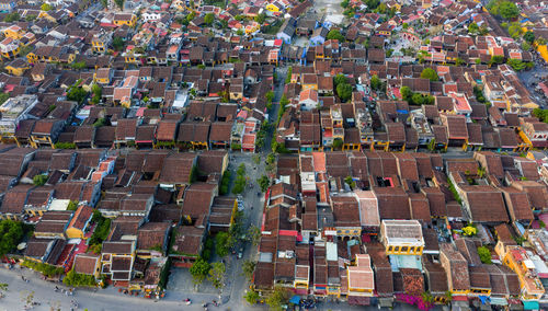 High angle view of street amidst buildings in town