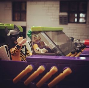 Close-up of hand holding toy car
