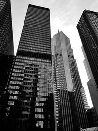 Low angle view of modern buildings against sky in city