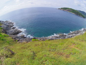 High angle view of sea shore against sky