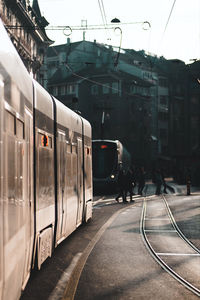 Train at railroad station in city