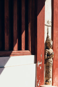 Open door on wall of building