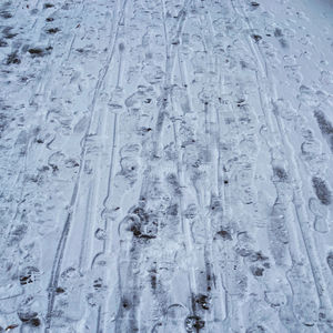 Full frame shot of icicles on land