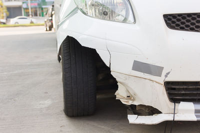 Close-up of car on street