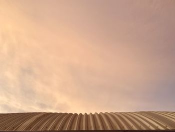 Low angle view of roof against sky