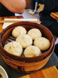 High angle view of vegetables in basket on table