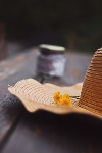 Close-up of yellow flower on table