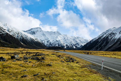 Scenic view of snowcapped mountains against sky